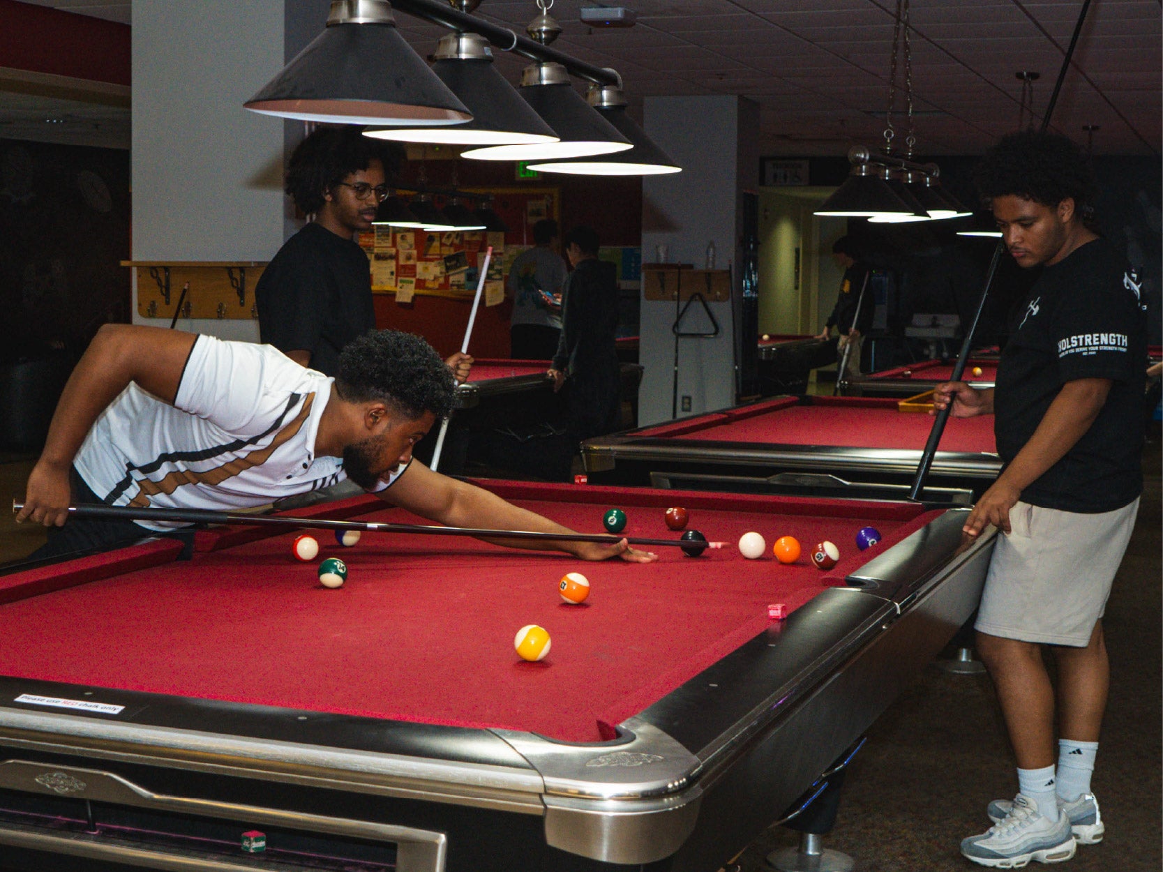 A photo of students playing Billards in TerpZone