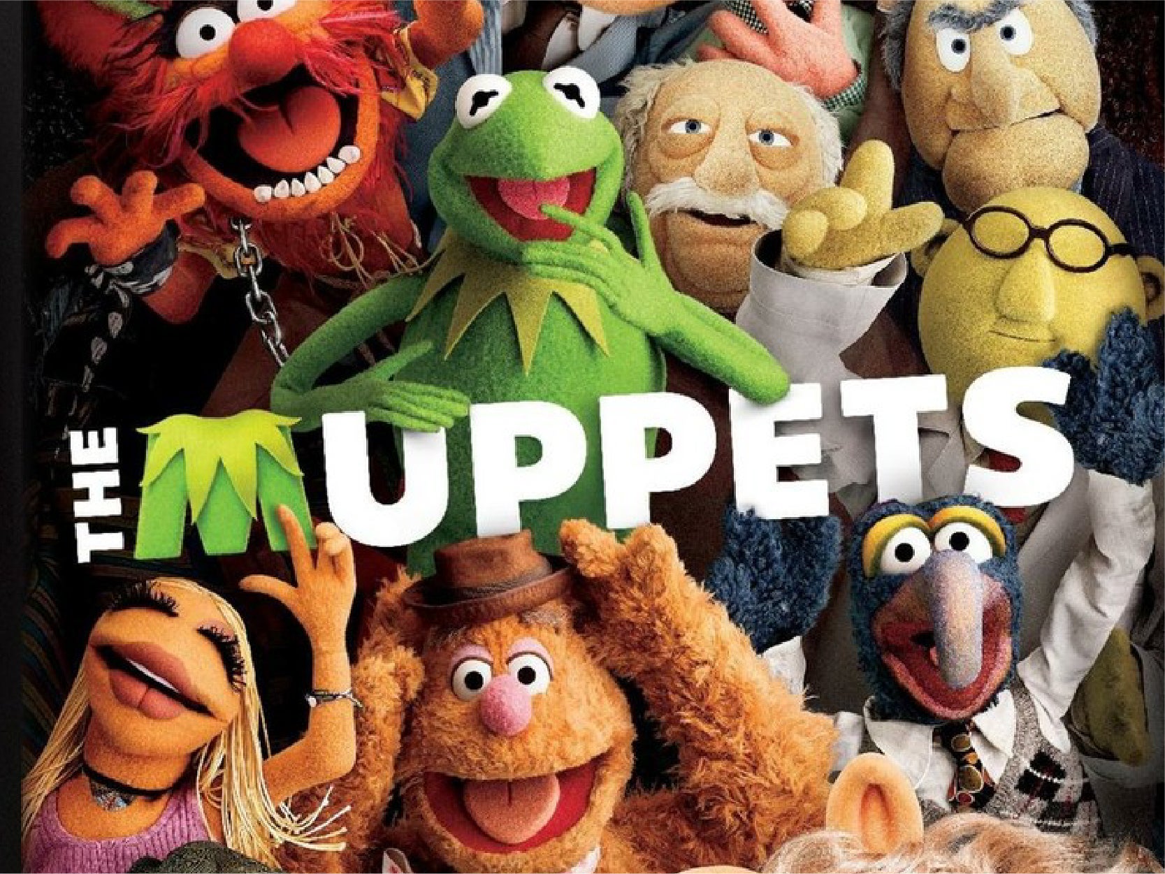 A promotional image from "The Muppets" movie showcasing various muppets.